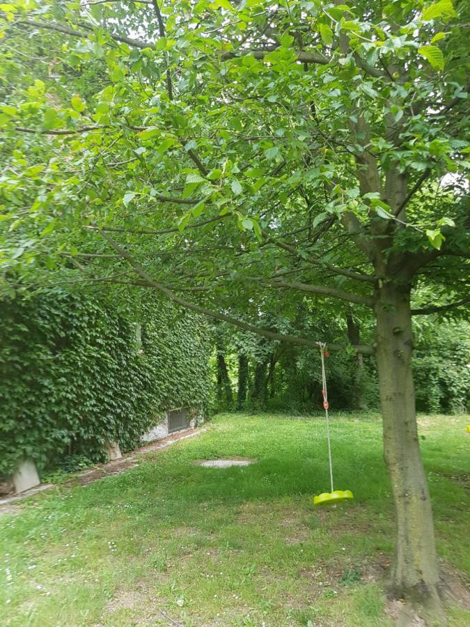 Le Case Nel Bosco Vanzago Exterior foto